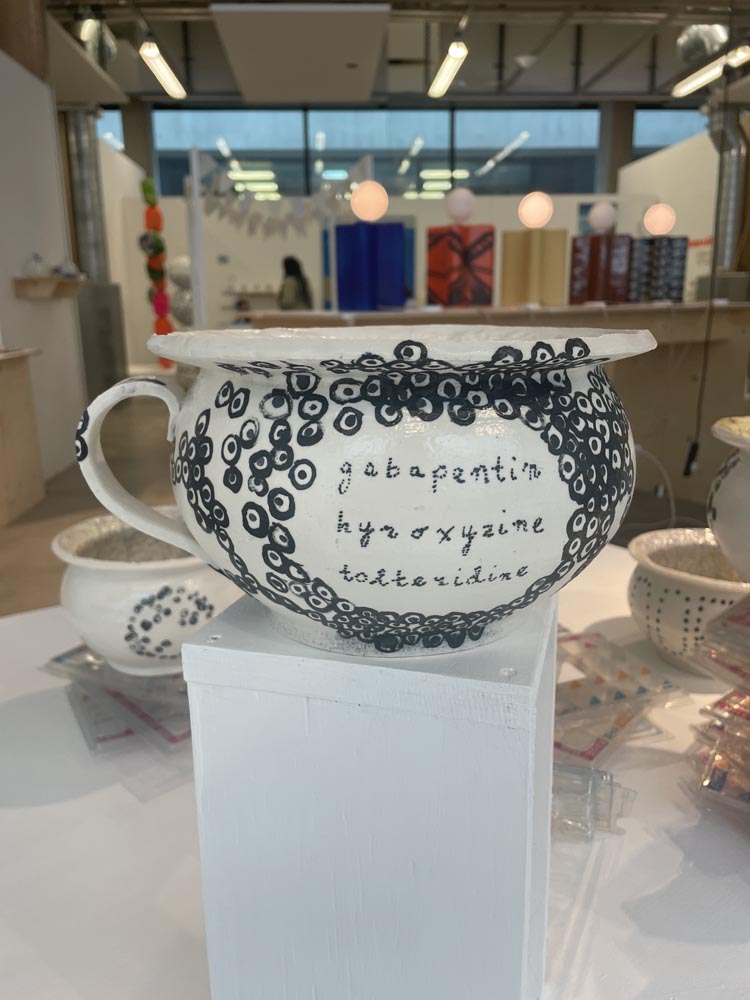 A porcelain chamber pot that says gabapentin, hydroxyzine, tolteridine.